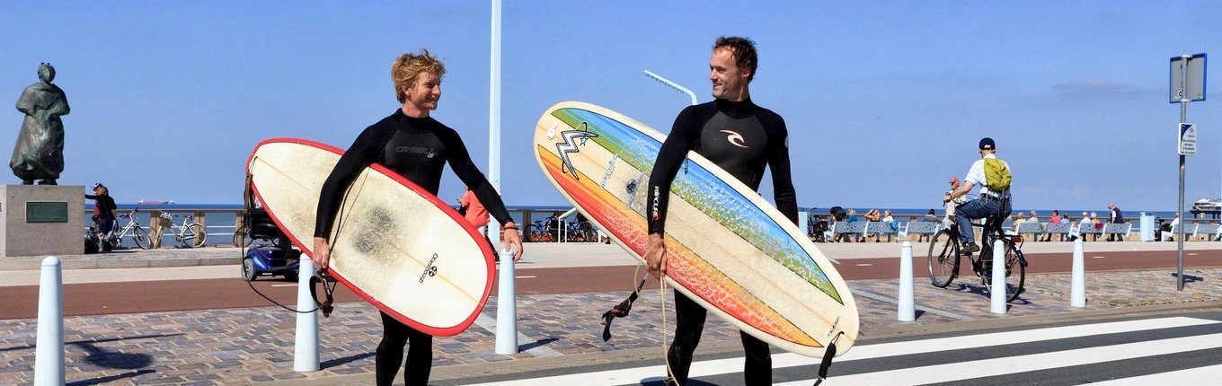 Surfers at the boulevard in Scheveningen Surfers at the boulevard in Scheveningen
